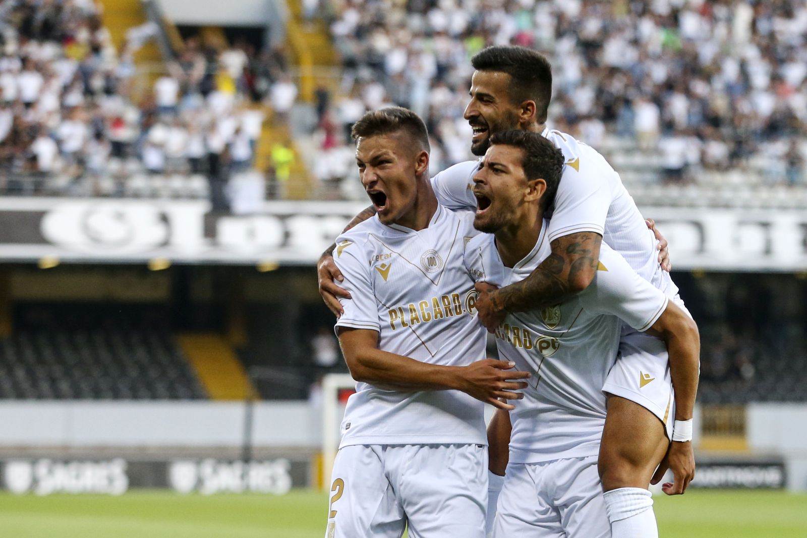 epa10085195 Vitoria de Guimaraes Ruben Lameiras (C) celebrates after scoring a goal against Puskas Akademia during their UEFA Europa Conference League qualification soccer match, held at D. Afonso Henriques stadium, in Guimaraes, Portugal, 21 July 2022.  EPA/JOSE COELHO