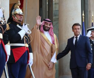 epa10096104 French President Emmanuel Macron  (R) welcomes Crown Prince, Mohammed Bin Salman Bin Abdulaziz Al-Saud (L), Vice President of the Council of Ministers of Defence of the Kingdom of Saudi Arabia, upon his arrival for a work dinner at Elysee palace in Paris, France, 28 July 2022.  EPA/CHRISTOPHE PETIT TESSON