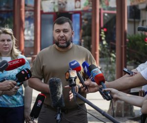 epa10147927 A picture taken during a visit to Donetsk organised by the Russian military shows Head of the self-proclaimed Donetsk People's Republic Denis Pushilin speaking with journalists near hotel Central damaged after shelling in Donetsk, Ukraine, 30 August 2022. On 24 February 2022 Russian troops entered the Ukrainian territory in what the Russian president declared a 'Special Military Operation', starting an armed conflict that has provoked destruction and a humanitarian crisis.  EPA/YURI KOCHETKOV