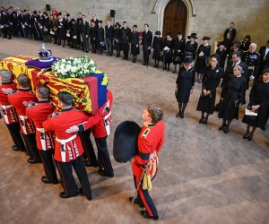 epa10184697 A handout photograph released by the UK Parliament shows pallbearers carrying in the coffin of Britain's Queen Elizabeth II past (L-R) Britain's Camilla, Queen Consort; Catherine, Princess of Wales; Sophie, Countess of Wessex; and Meghan, Duchess of Sussex into Westminster Hall for the service for the commencement of the Queen's Lying-in-State at the Palace of Westminster in London, Britain, 14 September 2022. The queen's lying in state will last for four days, ending on the morning of the state funeral on the 19 September.  EPA/UK PARLIAMENT/JESSICA TAYLOR HANDOUT -- MANDATORY CREDIT: UK PARLIAMENT/JESSICA TAYLOR -- HANDOUT EDITORIAL USE ONLY/NO SALES