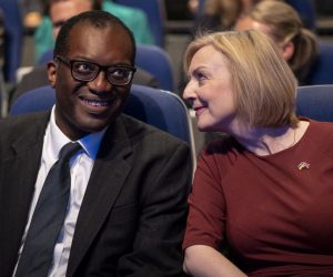 epa10219886 British Prime Minister Liz Truss (R) and Britain's Chancellor of the Exchequer Kwasi Kwarteng (L) chat at the opening session of Conservative Party Conference in Birmingham, Britain, 02 October 2022. Prime Minister Liz Truss admitted they were flaws with the announcement of her 'mini-budget' which led to market turmoils and British pound going historic low against the US dollar.  EPA/TOLGA AKMEN