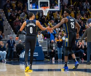 Nov 12, 2022; Indianapolis, Indiana, USA; Indiana Pacers guard Tyrese Haliburton (0) and Indiana Pacers forward Jalen Smith (25) celebrate a made basket in the second  half against the Toronto Raptors at Gainbridge Fieldhouse. Mandatory Credit: Trevor Ruszkowski-USA TODAY Sports