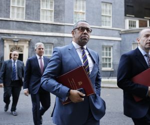 epa10250329 British Secretary of State for Foreign, Commonwealth and Development Affairs James Cleverly (C) with Justice Secretary Brandon Lewis (2nd L) and Northern Ireland Secretary Chris Heaton-Harris (R) leave a cabinet meeting in Downing Street, London, Britain, 18 October 2022. The meeting is chaired by Prime Minister Liz Truss.  EPA/TOLGA AKMEN