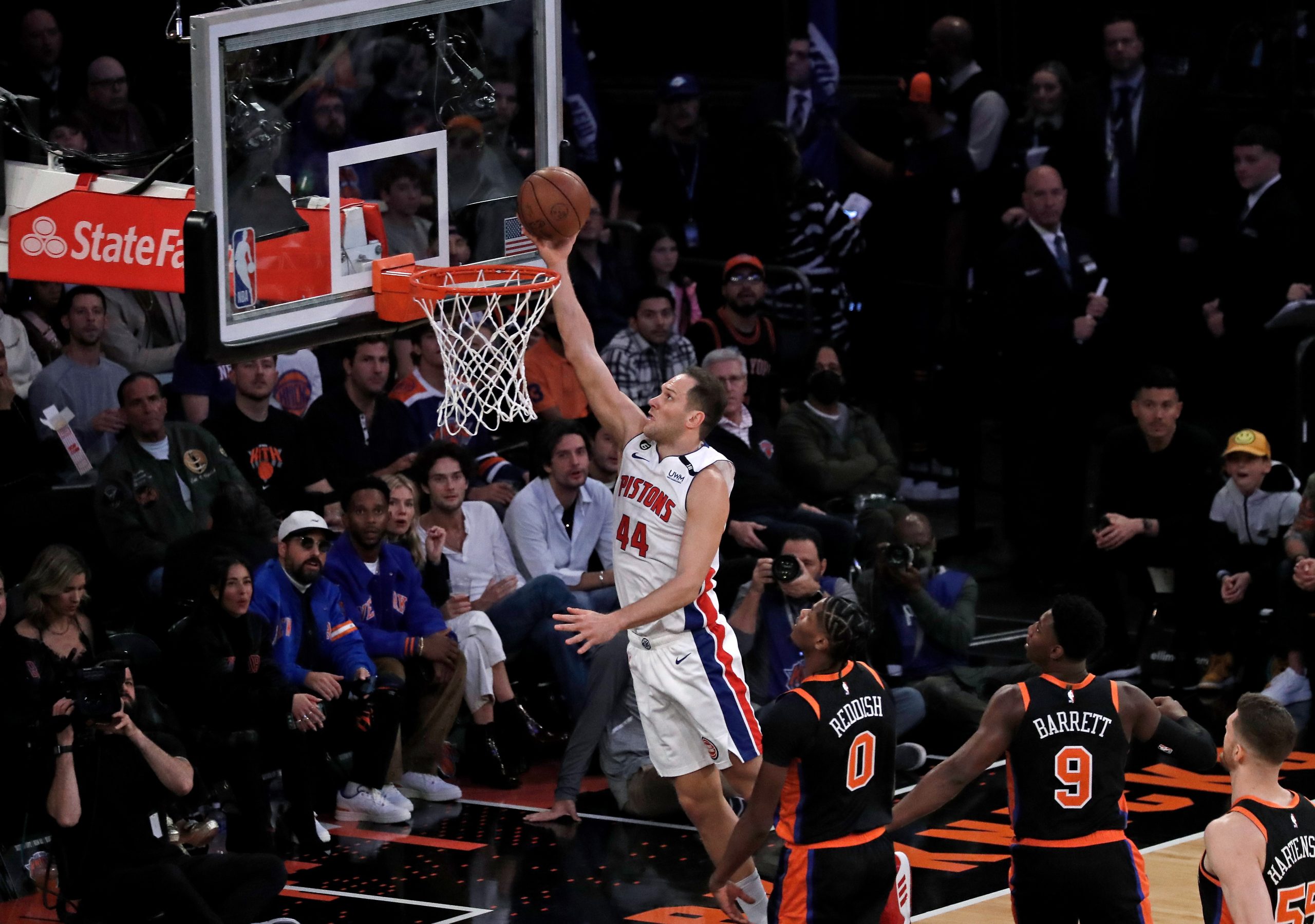 epa10301016 Detroit Pistons forward Bojan Bogdanovic (C) shoots over New York Knicks defenders during the first half of the NBA basketball game between the Detroit Pistons and the New York Knicks at Madison Square Garden in New York, New York, USA, 11 November 2022.  EPA/Peter Foley  SHUTTERSTOCK OUT