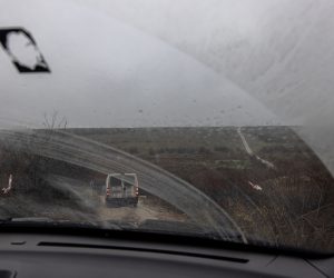 epa10331804 Volunteers drive in a minivan to remote frontline villages to deliver humanitarian aid and evacuate people in Kherson region, southern Ukraine, 26 November 2022 (issued 27 November 2022). The Ukrainian president accused the Russian army of deliberately destroying critical infrastructure during their withdrawal from the city of Kherson, including electricity and water supplies. Ukrainian troops entered Kherson on 11 November after the Russian army had withdrawn from the city which they captured in the early stage of the conflict, shortly after Russian troops had entered Ukraine in February 2022.  EPA/ROMAN PILIPEY