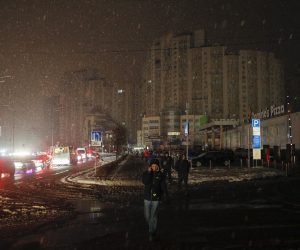 epa10368981 Residents walk along a dark street as electricity is cut after a massive rocket attack in Kyiv (Kiev), Ukraine, 16 December 2022 amid Russia's invasion. According to the Kyiv Military Administration, about 40 missiles were recorded on the day in the Ukrainian capital's airspace, 37 of which were shot down. A wave of Russian missile attacks on 16 December targeted the Ukrainian capital Kyiv and other parts of the country. Russian troops on 24 February entered Ukrainian territory, starting a conflict that has provoked destruction and a humanitarian crisis.  EPA/SERGEY DOLZHENKO