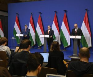 epa10375462 Hungarian Prime Minister Viktor Orban (C), Head of the Prime Minister's Office Gergely Gulyas (L) and Hungarian Secretary of State for International Communication and Relations Zoltan Kovacs (R) hold a year-end press conference in the government's headquarters in Budapest, Hungary, 21 December 2022.  EPA/SZILARD KOSZTICSAK HUNGARY OUT