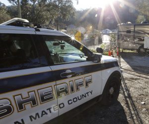 epa10427096 San Mateo County Sheriff vehicles at one of two scenes of mass shootings at farms in Half Moon Bay, California, USA, 24 January 2023. The suspected gunman who turned himself in to police reportedly killed seven and wounded one at two locations according to the San Mateo Sheriff.  EPA/JOHN G. MABANGLO