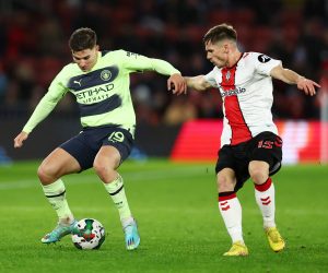 Soccer Football - Carabao Cup - Quarter Final - Southampton v Manchester City - St Mary's Stadium, Southampton, Britain - January 11, 2023  Manchester City's Julian Alvarez in action with Southampton's Romain Perraud REUTERS/David Klein EDITORIAL USE ONLY. No use with unauthorized audio, video, data, fixture lists, club/league logos or 'live' services. Online in-match use limited to 75 images, no video emulation. No use in betting, games or single club /league/player publications.  Please contact your account representative for further details. Photo: David Klein/REUTERS