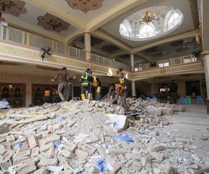 epa10440881 Rescue workers search for victims amid debris a day after a suicide bomb blast at a Mosque in Police Lines, in Peshawar, KPK province, Pakistan, 31 January 2023. The death toll from the suicide bombing has reached 92, police said on 31 January. Most of the deceased in the  attack, one of the deadliest ever staged on law enforcement authorities in Pakistan's history, are police and other members of the security forces.  EPA/ARSHAD ARBAB