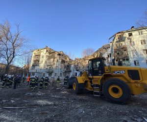 epa10498406 A handout photo made available by the State Emergency Service (SES) shows emergency services at the site of a damaged residential building in Zaporizhzhia, Ukraine, 02 March 2023. At least two people died and 11 others were injured after a rocket hit a five-story building in Zaporizhzhia, the State Emergency Service (SES) of Ukraine report. Russian troops entered Ukraine on 24 February 2022 starting a conflict that has provoked destruction and a humanitarian crisis.  EPA/STATE EMERGENCY SERVICE HANDOUT HANDOUT HANDOUT EDITORIAL USE ONLY/NO SALES