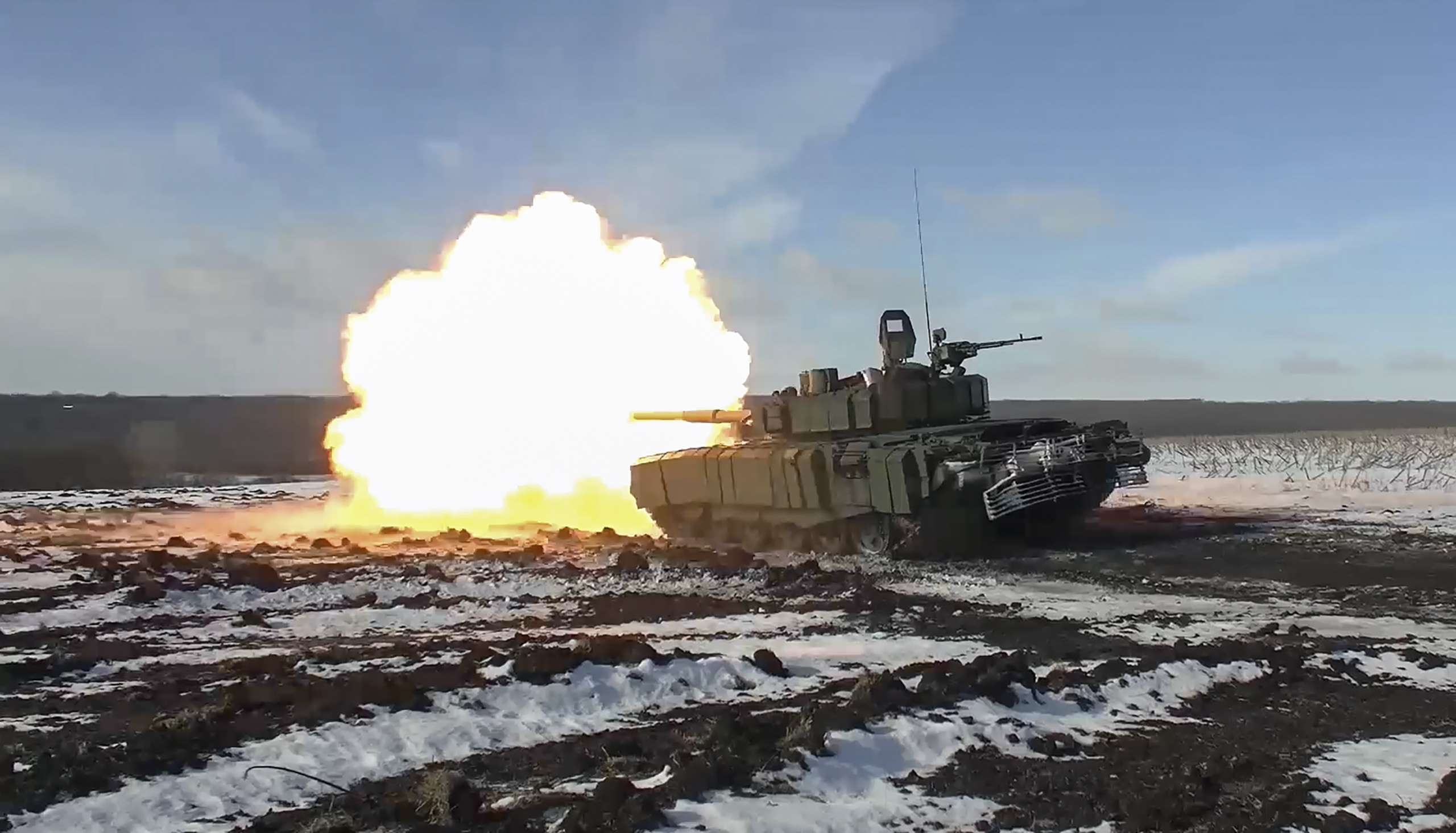 epa10507216 A still taken from a handout video made available 07 March 2023 by the Russian Defence Ministry's press service shows a Russian T-90 battle tank firing at an undisclosed location the in Donetsk region, Ukraine. On 24 February 2022 Russian troops entered the Ukrainian territory in what the Russian president declared to be a 'Special Military Operation', starting an armed conflict that has provoked destruction and a humanitarian crisis.  EPA/RUSSIAN DEFENCE MINISTRY PRESS SERVICE/HANDOUT HANDOUT  HANDOUT EDITORIAL USE ONLY/NO SALES