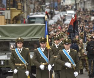 epa10513744 Thousands of people attend the funeral ceremony for Dmytro Kotsiubailo in Kyiv (Kiev), Ukraine, 10 March 2023. Commander Dmytro Kotsiubailo of the 67th brigade, call sign Da Vinci and awarded the title "Hero of Ukraine", was killed in action on the frontline in Bakhmut, eastern Ukraine, on 07 March 2023.  EPA/OLEG PETRASYUK