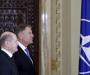 epa10556783 Romanian President Klaus Iohannis (R) and German Chancellor Olaf Scholz (L) leave after delivering their joint media statements at Cotroceni Presidential Palace in Bucharest, Romania, 03 April 2023. Chancellor Scholz is on an official visit to Romania.  EPA/ROBERT GHEMENT