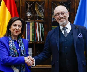 epa10569309 Ukranian Defense minister Oleksii Reznikov (R) greets Spanish Defense minister Margarita Robles (L) during their meeting held in Madrid, Spain, 12 April 2023.  EPA/J.J.Guillen / POOL