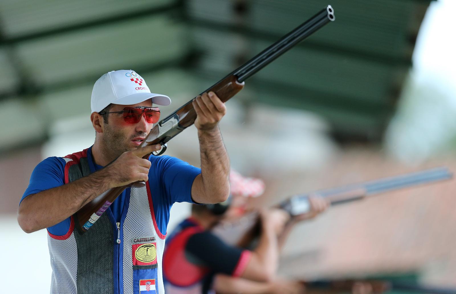 26.08.2012., Topolje - Na streljani SD Fazan Topolje pored Ivanic Grada, odrzano je Finale KUP-a Hrvatske u gadjanju letecih meta. Ovogodisnje finale okupilo je 30 najboljih hrvatskih strijelaca medju kojima je i sudionik Olimpijskih igara u Londonu Anton Glasnovic s bratom Josipom.rPhoto: Sanjin Strukic/PIXSELL