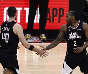 epa10560977 LA Clippers center Ivica Zubac (L) interacts with LA Clippers forward Kawhi Leonard after he scored during the first quarter of the game between the Los Angeles Clippers and the Los Angeles Lakers at Crypto.com Arena in Los Angeles, California, USA, 05 April 2023.  EPA/ETIENNE LAURENT SHUTTERSTOCK OUT