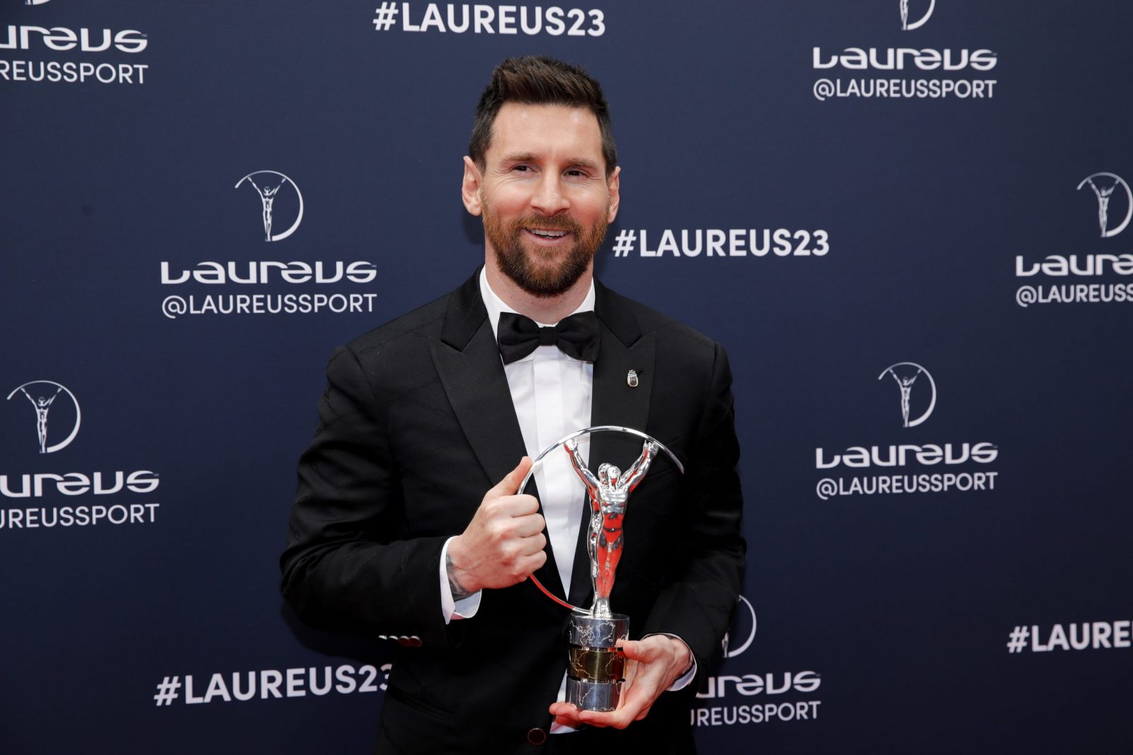 epa10615907 Argentinian soccer player Lionel Messi poses with Laureus World Sportsman of the Year award during the 2023 Laureus World Sports Awards in Paris, France, 08 May 2023. The awards ceremony will be an in-person event again after two years of virtual presentations due to the Covid-19 pandemic.  EPA/TERESA SUAREZ