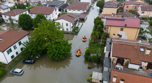 epa10638276 An aerial view of Italian firefighters' rescue teams searching for people trapped in their houses in Lugo, Italy, 19 May 2023. The death toll from this week's deadly flooding in the northeastern region of Emilia Romagna has climbed to 14 after the police recovered the body of a man in his 70s in Faenza on early May 19.  EPA/EMANUELE VALERI