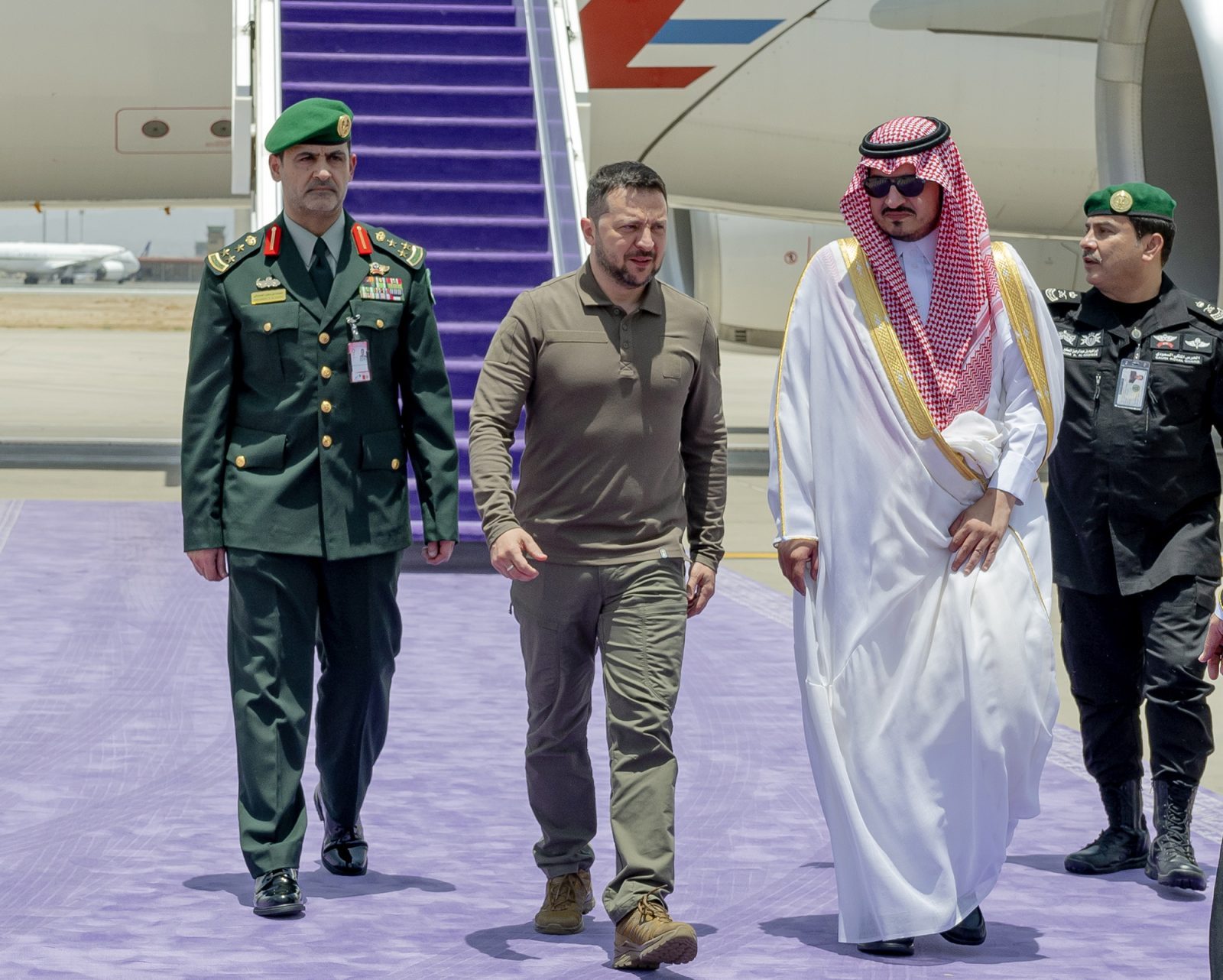 epa10638694 A handout photo made available by the Saudi Press Agency (SPA) shows Deputy Governor of Saudi Arabia's Makkah Region, Prince Badr bin Sultan bin Abdulaziz Al Saud (R) greeting Ukrainian president Volodymyr Zelensky upon his arrival to attend the 32nd Arab League summit, in Jeddah, Saudi Arabia, 19 May 2023. Zelensky is on his first-ever visit to Saudi Arabia.  EPA/SAUDI PRESS AGENCY HANDOUT  HANDOUT EDITORIAL USE ONLY/NO SALES