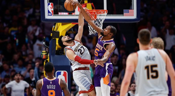 May 9, 2023; Denver, Colorado, USA; Phoenix Suns forward Kevin Durant (35) blocks the dunk of Denver Nuggets guard Jamal Murray (27) as guard Terrence Ross (8) and center Nikola Jokic (15) look on in the first quarter during game five of the 2023 NBA playoffs at Ball Arena. Mandatory Credit: Isaiah J. Downing-USA TODAY Sports Photo: Isaiah J. Downing/REUTERS