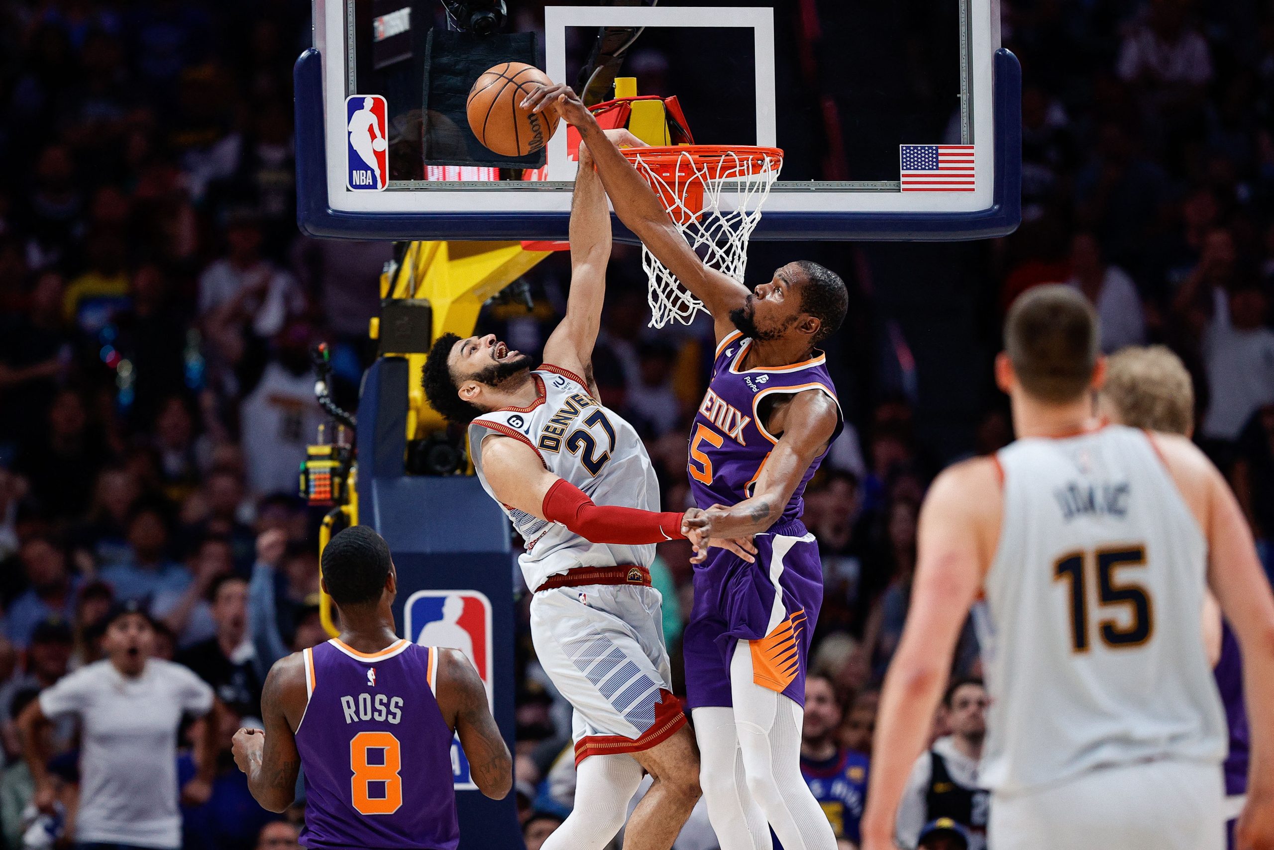 May 9, 2023; Denver, Colorado, USA; Phoenix Suns forward Kevin Durant (35) blocks the dunk of Denver Nuggets guard Jamal Murray (27) as guard Terrence Ross (8) and center Nikola Jokic (15) look on in the first quarter during game five of the 2023 NBA playoffs at Ball Arena. Mandatory Credit: Isaiah J. Downing-USA TODAY Sports Photo: Isaiah J. Downing/REUTERS