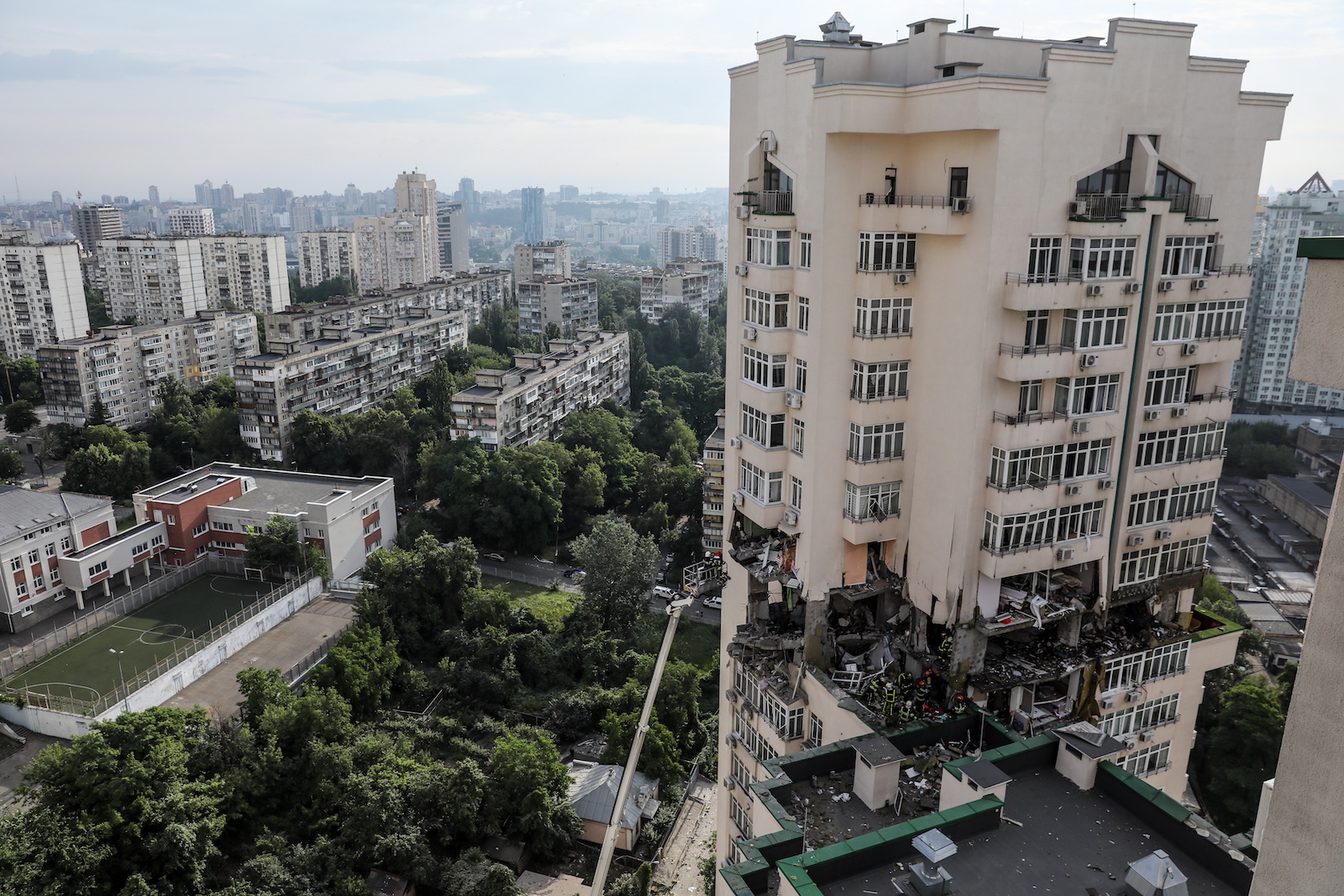 epa10709069 Rescue workers in action after an apartment block was damaged by rocket fragments in Kyiv (Kiev), Ukraine, 24 June 2023, amid the Russian invasion. At least three people were killed by rocket fragments hitting a high-rise building in the capitalâ€™s Solomyan district, Kyiv Mayor Vitali Klitschko confirmed. According to the Ukrainian Air Force, Russia fired 41 missiles and one shock drone on Ukraine. All air targets were shot down.  EPA/OLEG PETRASYUK