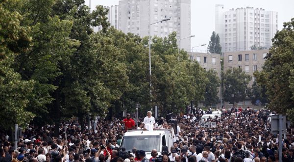 epa10717187 People attend a white walking in memory of 17-year-old Nahel who was killed by French Police in Nanterre, near Paris, France, 29 June 2023. Violence broke out after the police fatally shot a 17-year-old during a traffic stop in Nanterre on 27 June 2023. According to the French interior minister, 31 people were arrested with 2,000 officers being deployed to prevent further violence.  EPA/YOAN VALAT