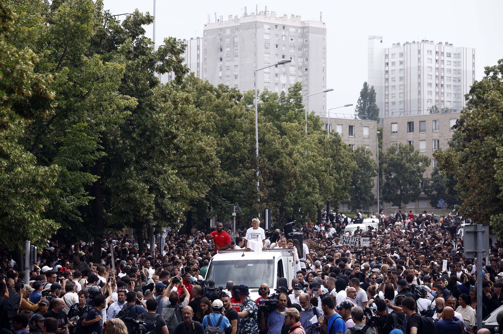 epa10717187 People attend a white walking in memory of 17-year-old Nahel who was killed by French Police in Nanterre, near Paris, France, 29 June 2023. Violence broke out after the police fatally shot a 17-year-old during a traffic stop in Nanterre on 27 June 2023. According to the French interior minister, 31 people were arrested with 2,000 officers being deployed to prevent further violence.  EPA/YOAN VALAT