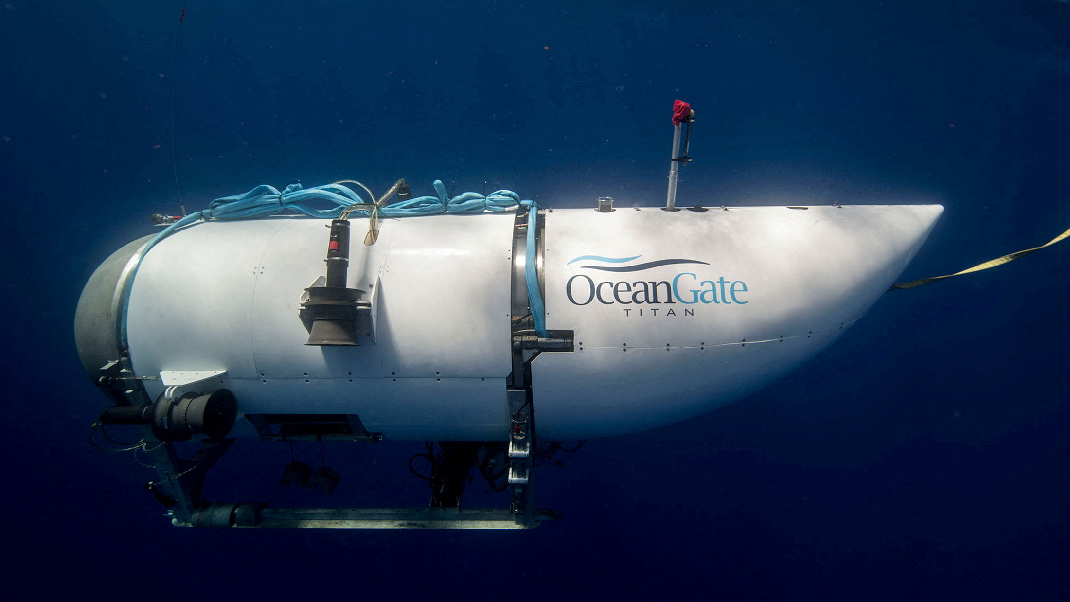 FILE PHOTO: The Titan submersible, operated by OceanGate Expeditions to explore the wreckage of the sunken SS Titanic off the coast of Newfoundland, dives in an undated photograph.  OceanGate Expeditions/Handout via REUTERS  NO RESALES. NO ARCHIVES. THIS IMAGE HAS BEEN SUPPLIED BY A THIRD PARTY./File Photo Photo: OCEANGATE EXPEDITIONS/REUTERS