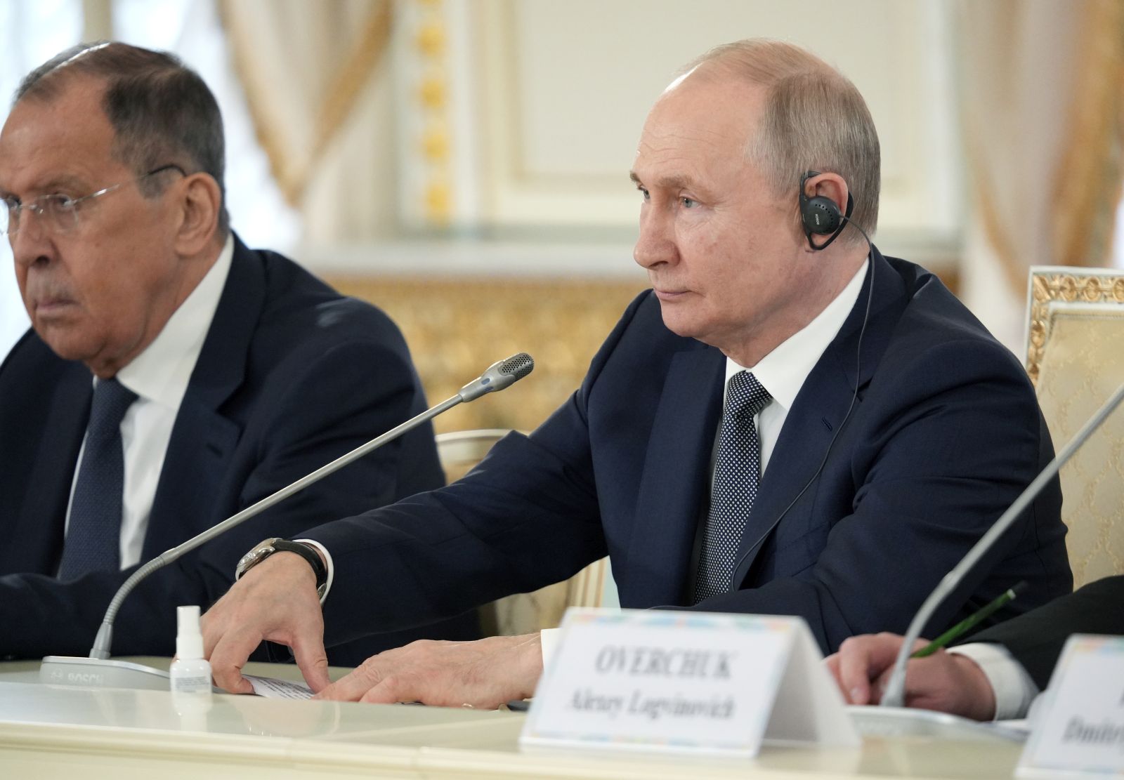 epa10769861 Russian President Vladimir Putin (R) and Russian Foreign Minister Sergei Lavrov (L) during their meeting with Ethiopian Prime Minister Abiy Ahmed ahead of the Second Economic and Humanitarian Forum ‘Russia-Africa’ Summit in St.Petersburg, Russia, 26 July 2023. The Second Economic and Humanitarian Forum ‘Russia-Africa’ Summit will be held from July 27 to 28 in the congress-exhibition center Expoforum.  EPA/ALEXANDER KAZAKOV / SPUTNIK / KREMLIN POOL MANDATORY CREDIT