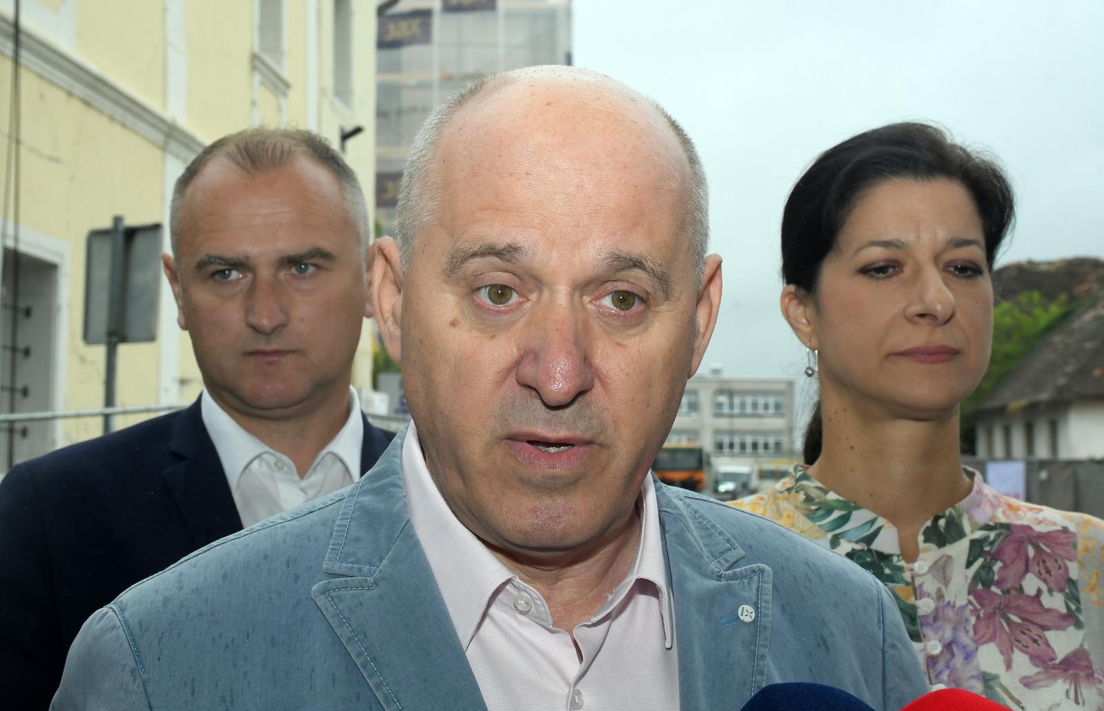 04.07.2023.,Petrinja - Potpredsjednik Vlade RH i ministar Branko Bacic posjetio je Petrinju i od gradonacelnice saznaop odatke o nekim projektim obnove koji su u tijeku. Nakon saastanka obisli su radove na Galeriji Krsto Hegedusic te radove na zgradama koje su pojedinacno kulturno dobro na Trgu dr. Franje Tudjmana. Photo: Nikola Cutuk/PIXSELL