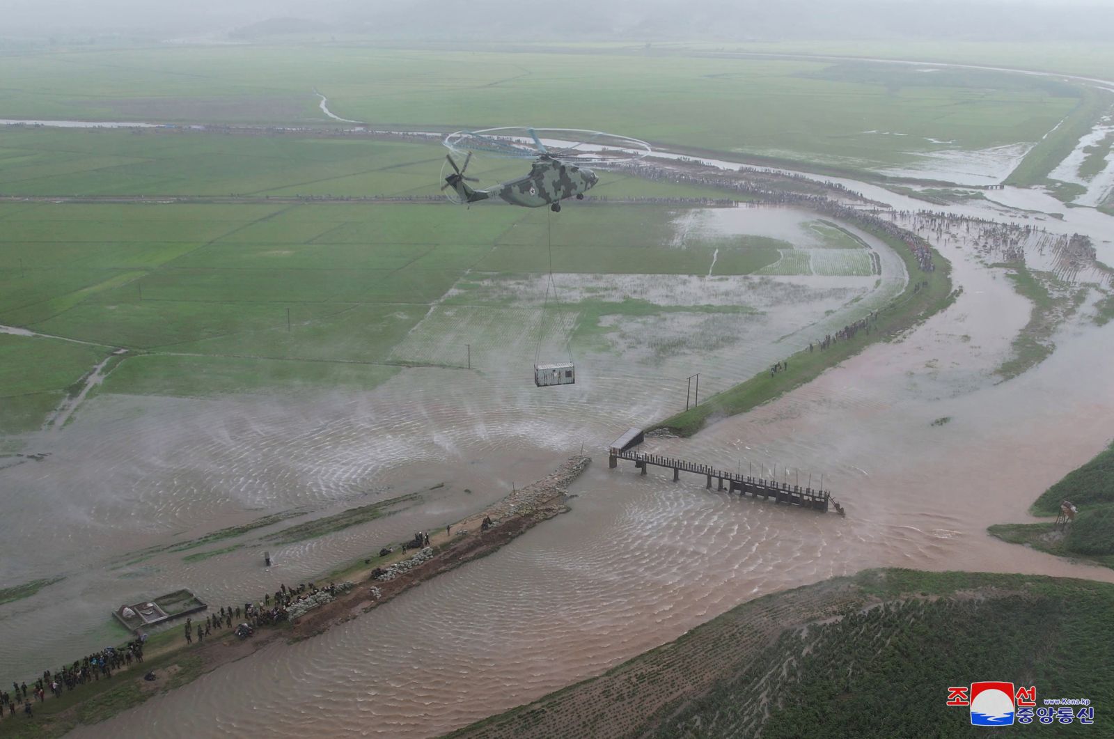 epa10799318 An undated photo released by the official North Korean Central News Agency (KCNA) on 14 August 2023 shows a typhoon-hit area during a visit of North Korean leader Kim Jong Un in Ogye-ri, Anbyon County of Kangwon Province, North Korea. According to KCNA, the downpour and tidal wave caused by Typhoon No. 6, broke down the embankments of rivers and caused 200-odd hectares of farmland to come under water in some areas of Kangwon Province some days ago.  EPA/KCNA   EDITORIAL USE ONLY