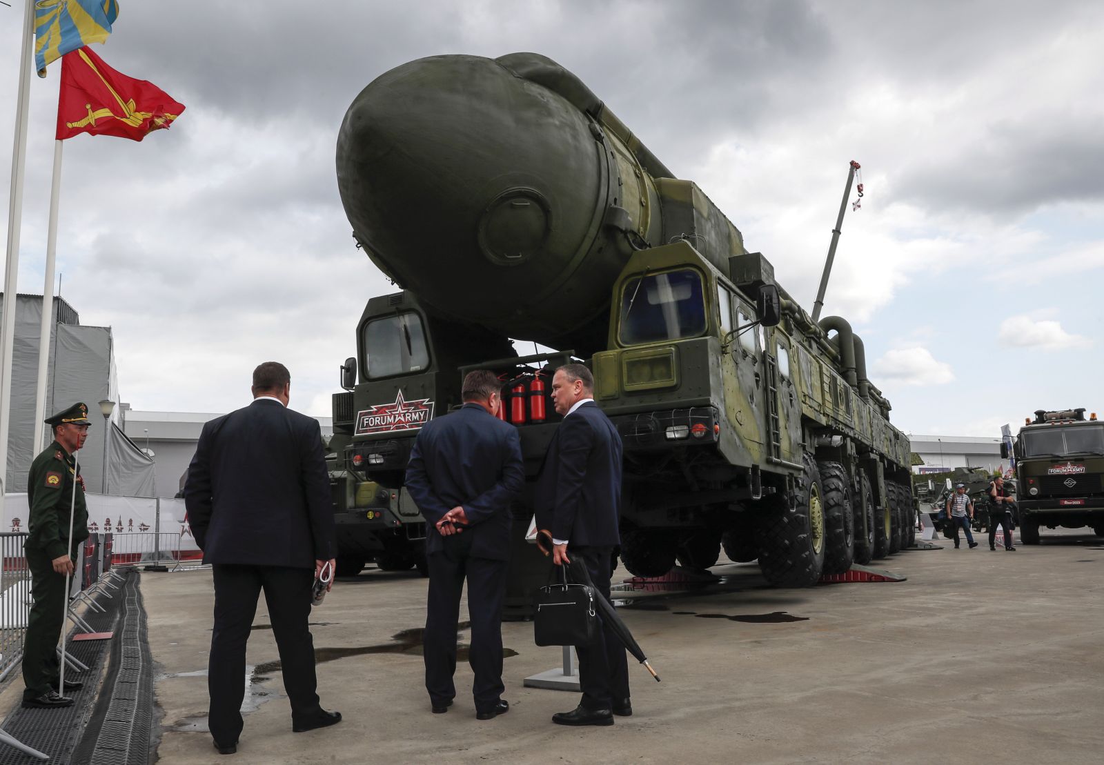 epa10800095 Visitors and specialists walks past Russian strategic ballistic missile Topol launching vehicle during the International Military-Technical Forum 'Army-2023' held at the Patriot Park in Kubinka, outside Moscow, Russia, 14 August 2023. The International Military-Technical Forum 'Army-2023' is held from 14 to 20 August 2023 at Patriot Expo, Kubinka Air Base and Alabino military training grounds.  EPA/YURI KOCHETKOV