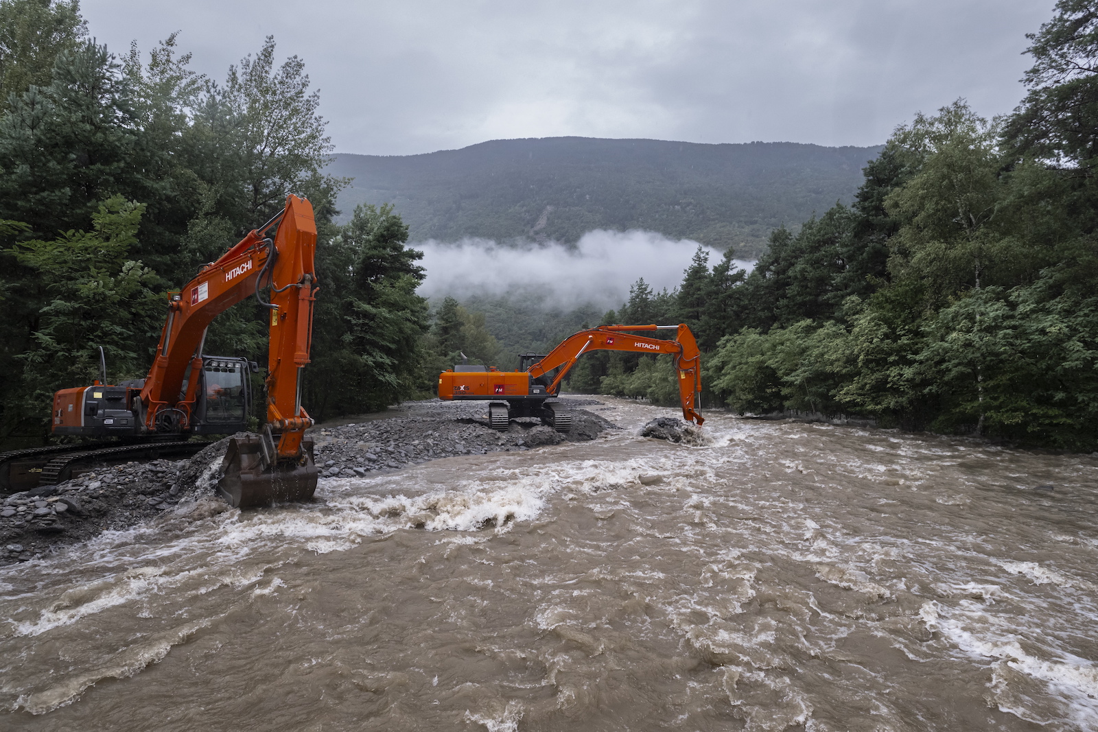 epa10825219 The Legiuna creek carries a lot of water, flooding and damaging the sourounding area, after heavy rainfalls in southern Switzerland in Malvaglia, Switzerland, 28 August 2023. The canton Tessin, Switzerland, has been flooded with rain since Friday night 25 August. According to forecasts, the rains will continue until 28 August.  EPA/Pablo Giananazzi ONLY PRESS