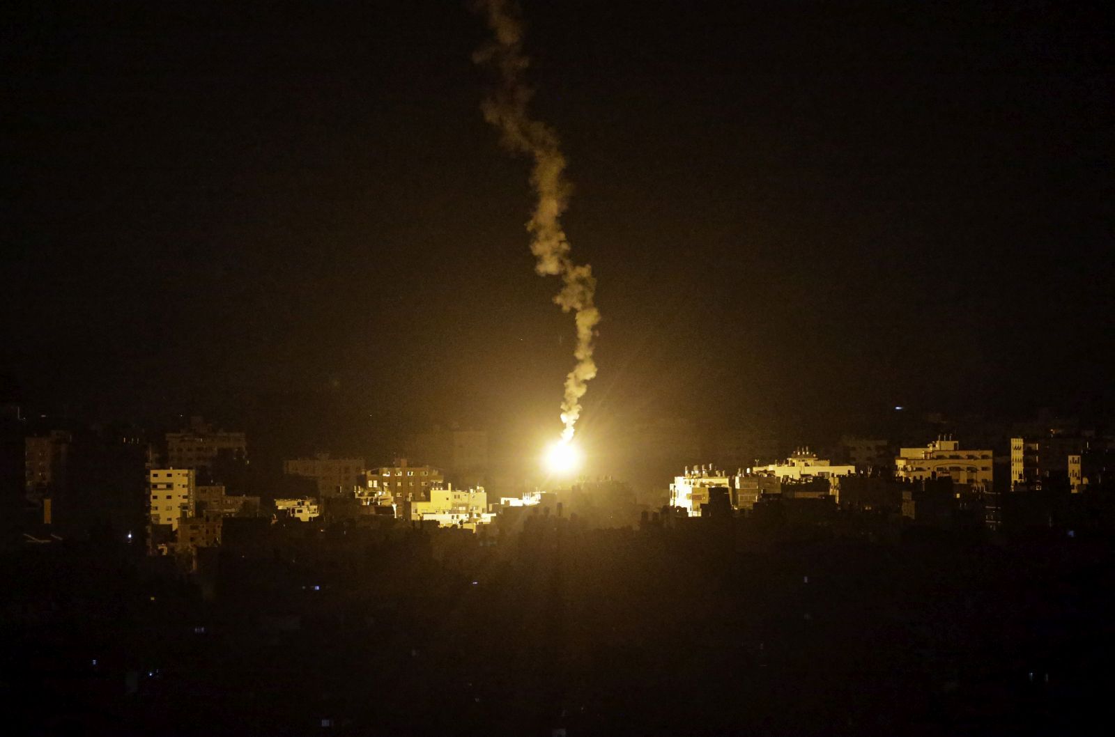 epa10914215 An Israeli army flare illuminates the sky above the northern Gaza strip, on, 11 October 2023. More than 1,000 Palestinians have been killed and over 5,000 others injured, according to the Palestinian Ministry of Health, after Israel started bombing the Palestinian enclave in response to attacks carried out by the Islamist movement Hamas on Israel from the Gaza Strip on 07 October. More than 3,000 people, including 1,500 militants from Hamas, have been killed and thousands injured in Gaza and Israel since 07 October, according to Israeli military sources and Palestinian officials.  EPA/MOHAMMED SABER