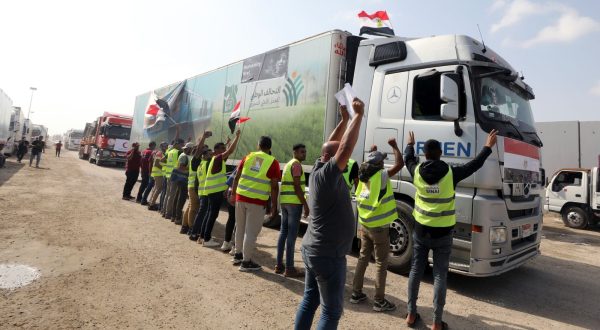 epa10932627 A truck carrying humanitarian aid for the Gaza Strip crosses the Rafah border gate, in Rafah, Egypt, 22 October 2023. Following negotiations between Egypt, the US, and Israel to allow relief aid to enter the Gaza Strip, some 20 aid trucks carrying food, water, and medicine were allowed into the Gaza Strip through the Rafah land crossing on 21 October. 17 more aid trucks were allowed in on 22 October, but UN agencies said it was far from sufficient and many more were needed to be allowed in.  EPA/KHALED ELFIQI