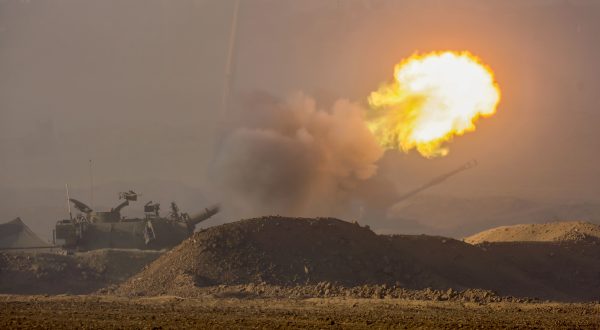 epa10949982 Israel Defense Forces (IDF) soldiers fire a 155 mm howitzer at an undisclosed location near the border with Gaza, southern Israel, 31 October 2023. Over the last day Israeli forces struck approximately 300 targets as part of its 'expanded ground operations' in the Gaza Strip, the Israel Defense Forces (IDF) said on 31 October. More than 8,000 Palestinians and at least 1,400 Israelis have been killed, according to the IDF and the Palestinian health authority, since Hamas militants launched an attack against Israel from the Gaza Strip on 07 October, and the Israeli operations in Gaza and the West Bank which followed it.  EPA/HANNIBAL HANSCHKE