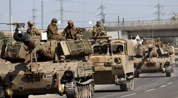 epa10955805 An Israeli artillery unit moves toward the border with the Gaza Strip, southern Israel, 03 November 2023. More than 9,000 Palestinians and at least 1,400 Israelis have been killed, according to the Israel Defense Forces (IDF) and the Palestinian health authority, since Hamas militants launched an attack against Israel from the Gaza Strip on 07 October, and the Israeli operations in Gaza and the West Bank which followed it. Israeli military spokesperson Daniel Hagari announced on 02 November that IDF troops 'completed the encirclement of Gaza City' as Israel continues 'ground, air and naval strikes' in the Gaza Strip.  EPA/ATEF SAFADI