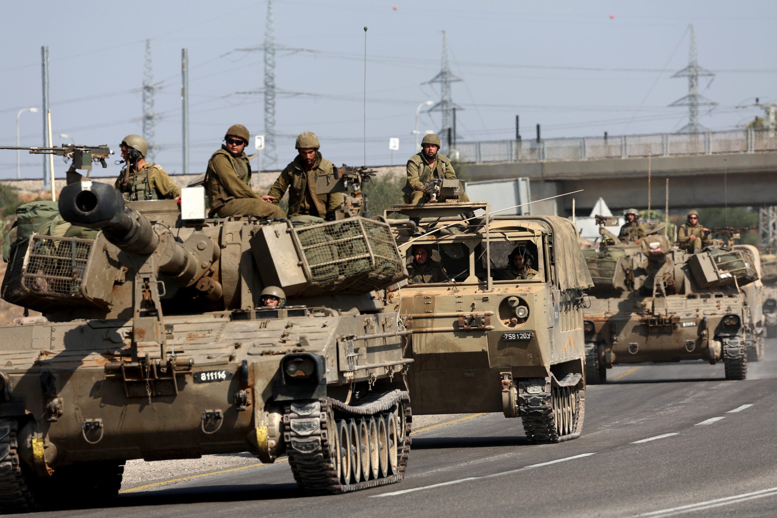 epa10955805 An Israeli artillery unit moves toward the border with the Gaza Strip, southern Israel, 03 November 2023. More than 9,000 Palestinians and at least 1,400 Israelis have been killed, according to the Israel Defense Forces (IDF) and the Palestinian health authority, since Hamas militants launched an attack against Israel from the Gaza Strip on 07 October, and the Israeli operations in Gaza and the West Bank which followed it. Israeli military spokesperson Daniel Hagari announced on 02 November that IDF troops 'completed the encirclement of Gaza City' as Israel continues 'ground, air and naval strikes' in the Gaza Strip.  EPA/ATEF SAFADI