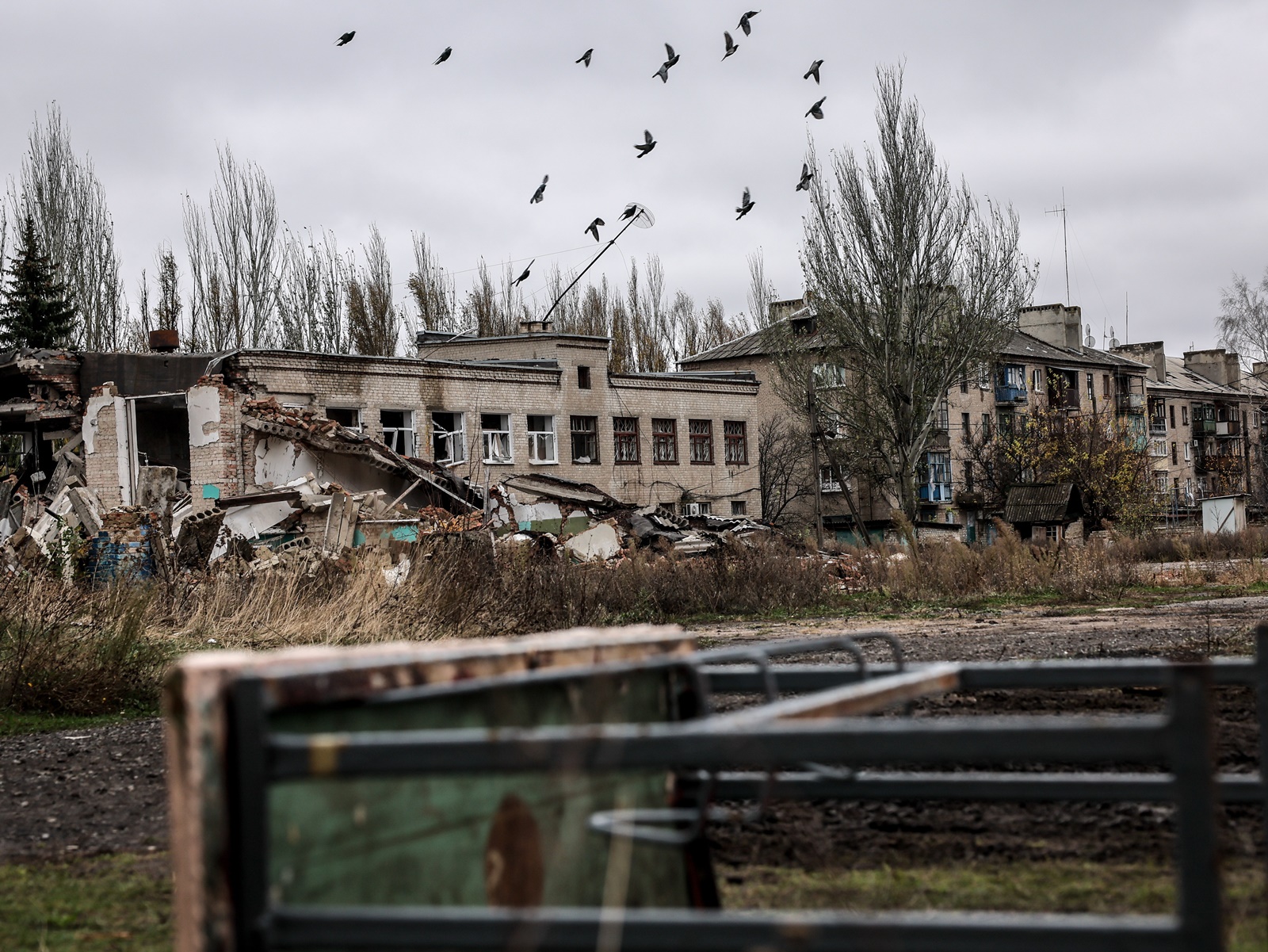 epa10966196 A damaged school building in Chasiv Yar, near the frontline in the Donetsk region, Ukraine, 09 November 2023, amid the Russian invasion. Russian troops entered Ukrainian territory in February 2022, starting a conflict that has provoked destruction and a humanitarian crisis.  EPA/OLEG PETRASYUK