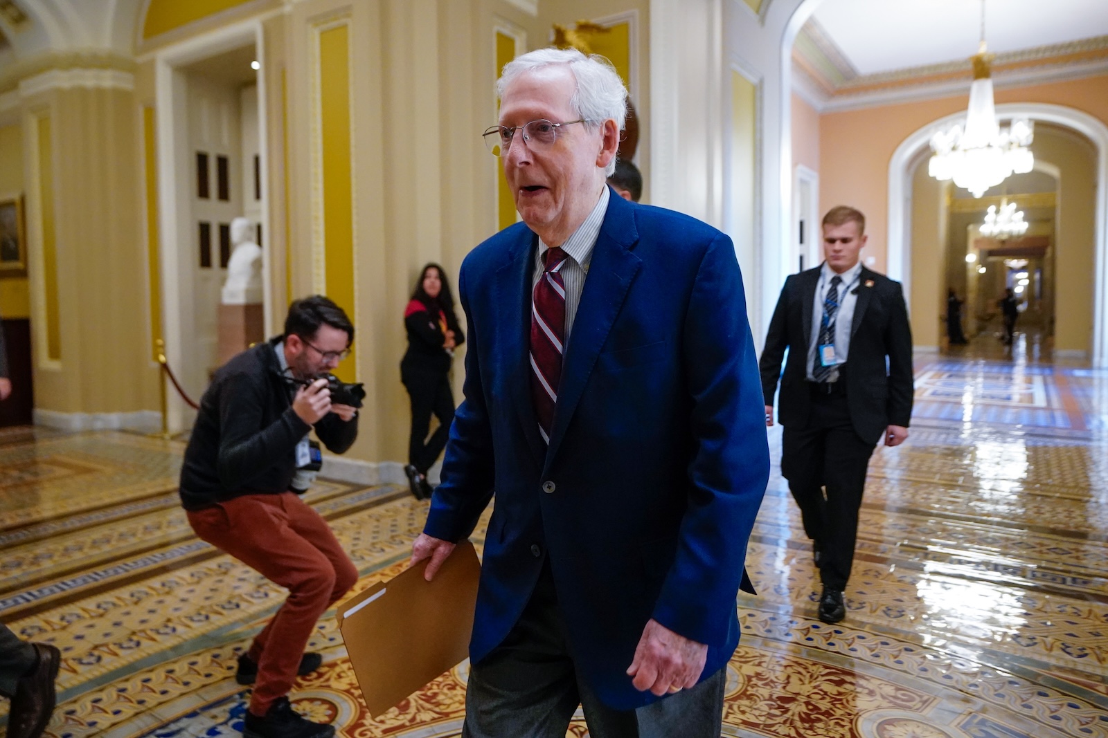 epa10998261 Senate Minority Leader Mitch McConnell walks to the Senate floor to deliver remarks in the US Capitol in Washington, DC, USA, 27 November 2023. Senate Majority Leader Chuck Schumer has said the Senate has a list of urgent work to complete before years end including national security supplemental funding, the National Defense Authorization Act, and confront the blockade in the Senate of military promotions.  EPA/SHAWN THEW