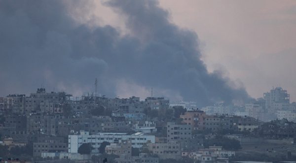 epa10999181 Smoke rises over damaged buildings on the northern part of the Gaza Strip, as seen from Sderot, southern Israel, 28 November 2023. The Israeli Defense Forces (IDF) announced on 28 November that three explosive devices were detonated near IDF troops in two locations in the northern Gaza Strip, in what it called a violation of 'the framework of the operational pause'. In one of the locations, Israeli troops were shot at and responded with fire. A number of soldiers were 'lightly injured' in the incidents, the statement added. Israel and Hamas agreed to a four-day ceasefire, mediated by Qatar, the US, and Egypt, that came into effect at 05:00 AM GMT on 24 November. On 27 November the ceasefire was extended by 48 hours.  EPA/CHRISTOPHE PETIT TESSON