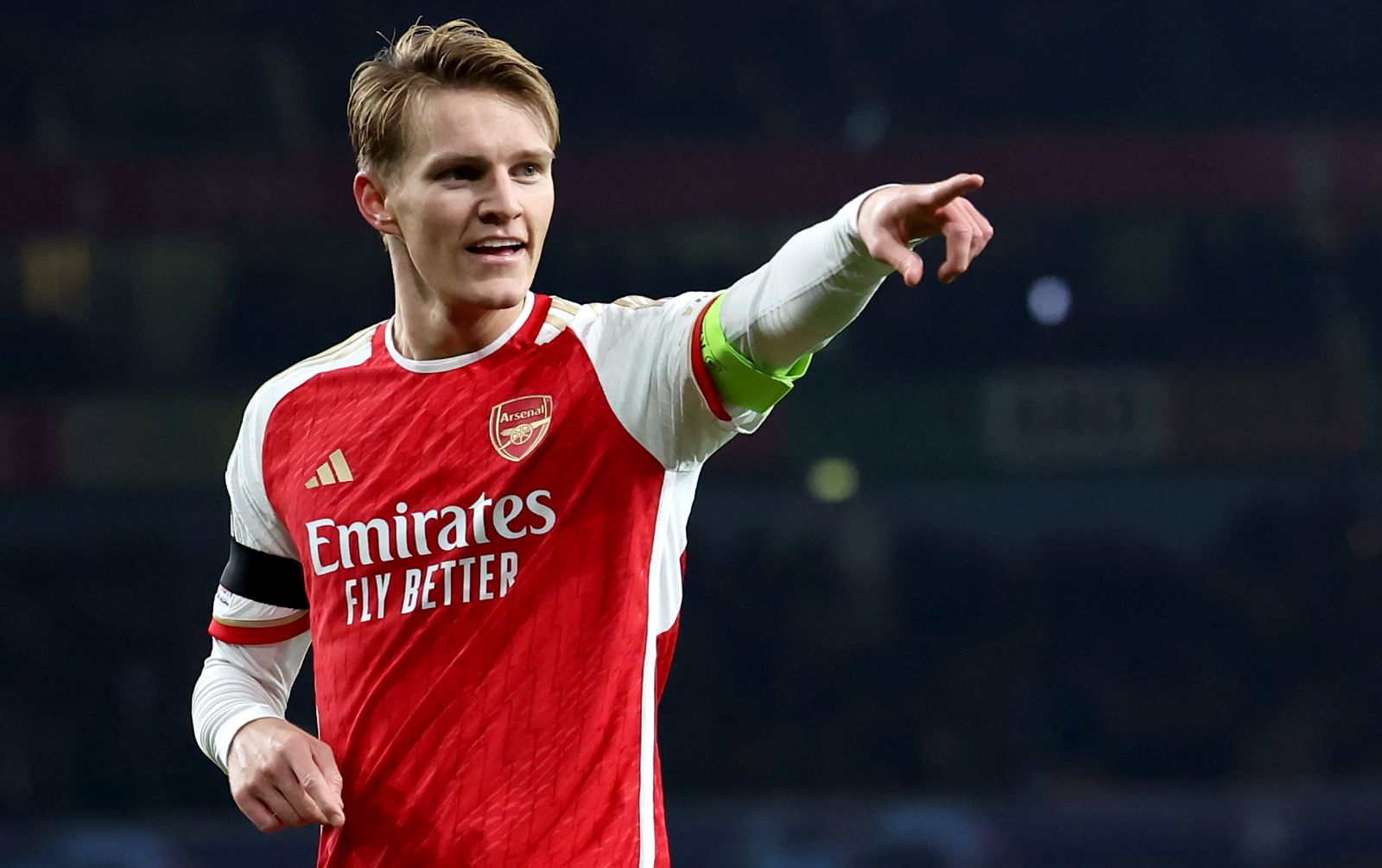 epa11002253 Martin Odegaard of Arsenal celebrates after scoring his team's 5th goal during the UEFA Champions League group B match between Arsenal and RC Lens in London, Britain, 29 November 2023.  EPA/ANDY RAIN