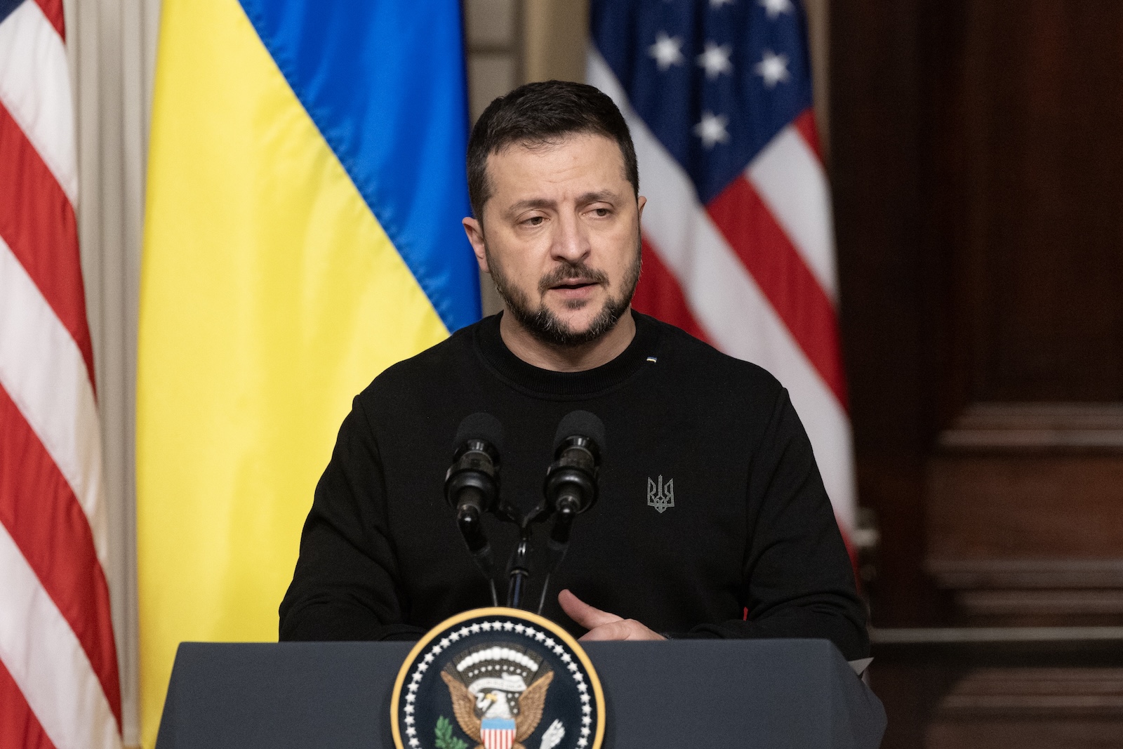 epa11025640 Ukrainian President Volodymyr Zelensky speaks during a joint news conference with US President Joe Biden (not pictured) in the Indian Treaty Room of the Eisenhower Executive Office Building, on the White House complex in Washington, DC, USA, 12 December 2023. Ukrainian President Zelensky is in Washington to meet with members of Congress at the US Capitol and US President Joe Biden at the White House to make a last-ditch effort to convince the US Congress for further military aid before the holiday recess. Republicans want concessions from Democrats on border security in order to support aid to Ukraine.  EPA/MICHAEL REYNOLDS