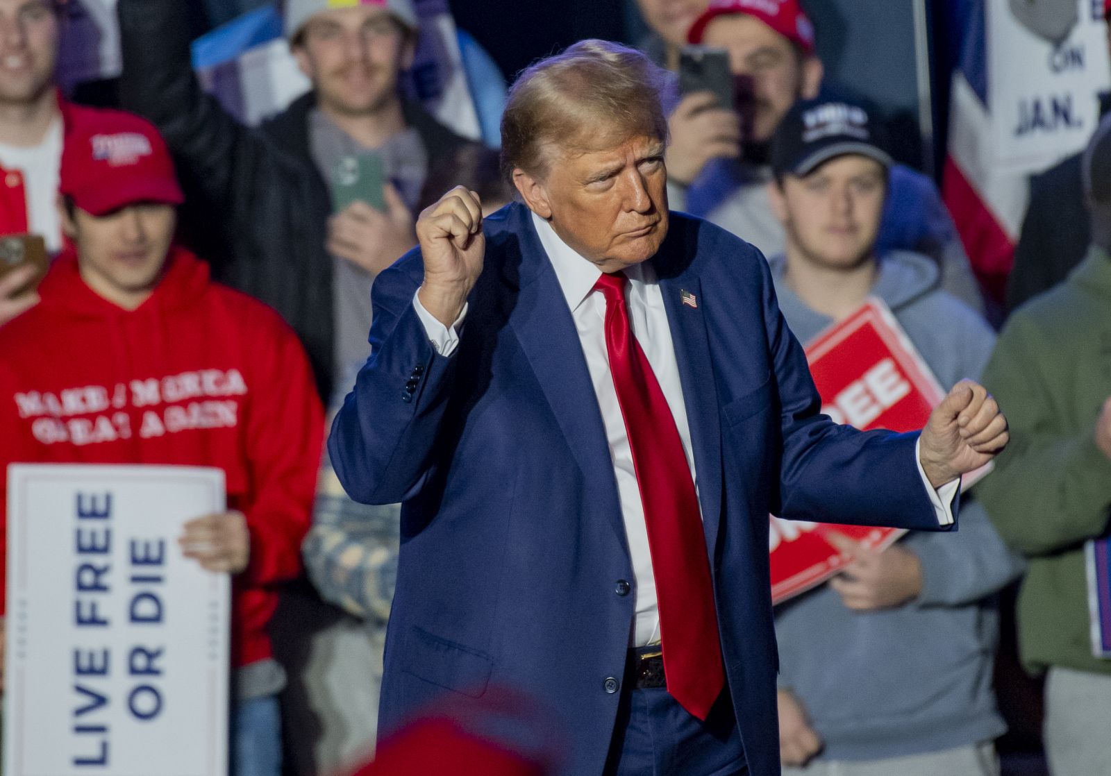 epa11033211 Republican candidate for President Former US President Donald Trump, dances for the crowd of supporters after his address during a rally at the University of New Hampshire in Durham, New Hampshire, USA, 16 December 2023. The New Hampshire Republican primary will take place on 23 January 2024.  EPA/AMANDA SABGA