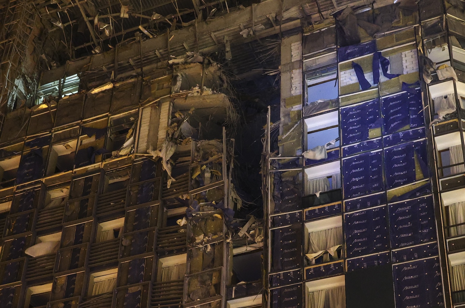 epa11049926 An exterior view of the damaged Kharkiv Palace Hotel following a Russian missile strike in downtown Kharkiv, eastern Ukraine, 30 December 2023. At least eight people were injured as a result of missile strikes in Kharkiv, the National police reported on 30 December. Russian troops entered Ukraine in February 2022 starting a conflict that has provoked destruction and a humanitarian crisis.  EPA/SERGEY KOZLOV