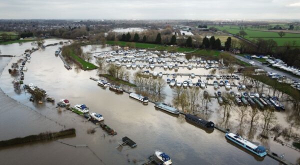epa11057166 An aerial photograph taken by drone of flooding from the River Ouse near York, Britain, 04 January 2024. Large parts of Britain are still experiencing flood warnings after Storm Henk brought heavy rain to already saturated ground.  EPA/ADAM VAUGHAN