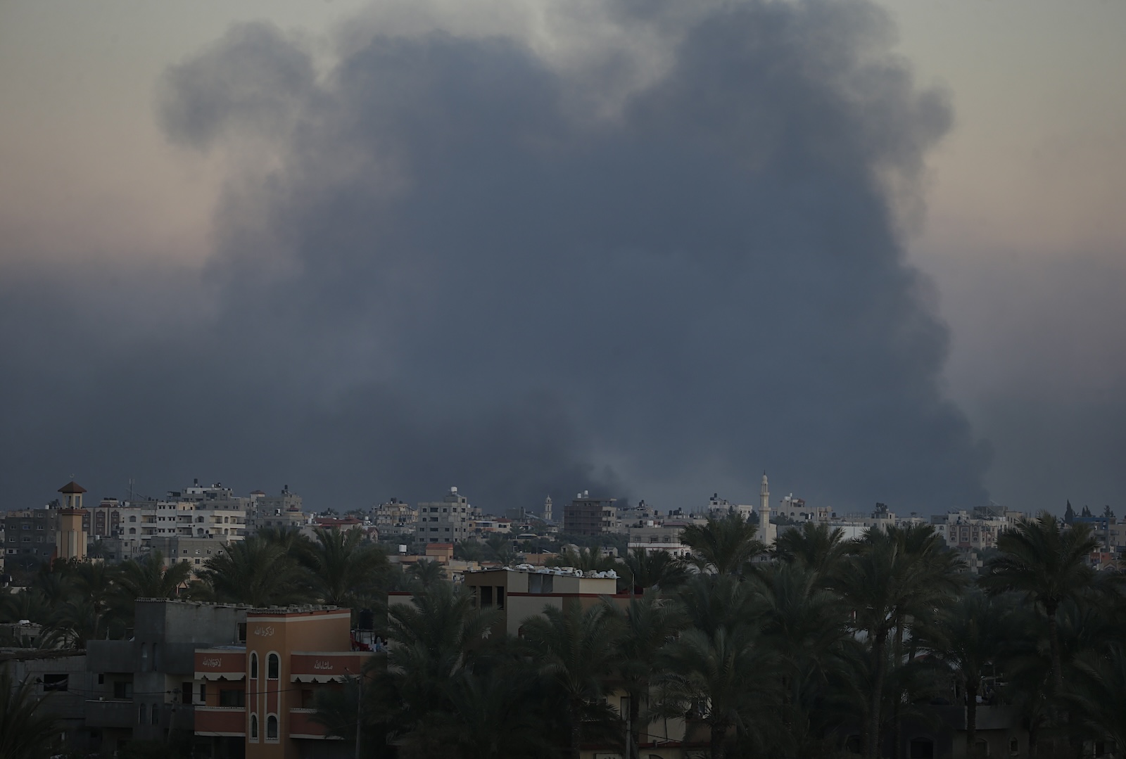 epa11059805 Smoke rises during Israeli military operations in the east of Al Maghazi ans Al Bureije refugee camps, southern Gaza Strip on, 05 January 2024. More than 22,300 Palestinians and at least 1,300 Israelis have been killed, according to the Palestinian Health Ministry and the Israel Defense Forces (IDF), since Hamas militants launched an attack against Israel from the Gaza Strip on 07 October, and the Israeli operations in Gaza and the West Bank which followed it. Since 07 October, up to 1.9 million people, or more than 85 percent of the population, have been displaced throughout the Gaza Strip, some more than once, according to the United Nations Relief and Works Agency for Palestine Refugees in the Near East (UNRWA), which added that most civilians in Gaza are in 'desperate need of humanitarian assistance and protection'.  EPA/MOHAMMED SABER