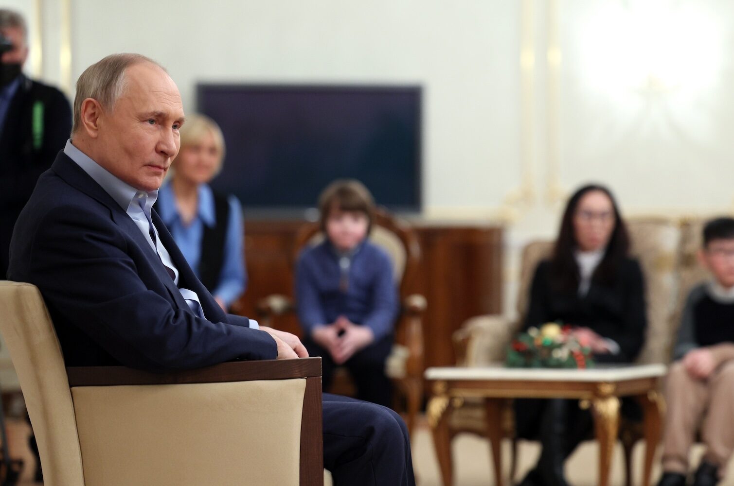 epa11061723 Russian President Vladimir Putin (L) meets with family members of servicemen, who died during a 'special military operation' at Novo-Ogaryovo residence outside Moscow, Russia, 06 January 2024.  EPA/GAVRIIL GRIGOROV / SPUTNIK / KREMLIN POOL MANDATORY CREDIT